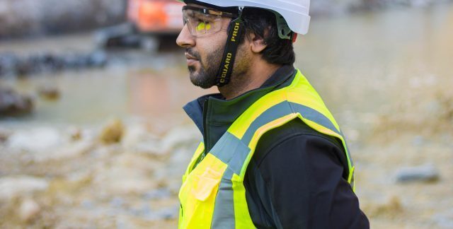 Health and safety engineering in a hard hat and high visibility jacket