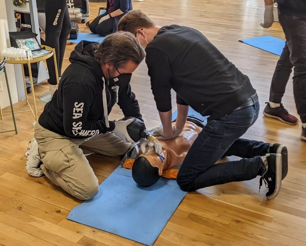 First aid students practicing CPR