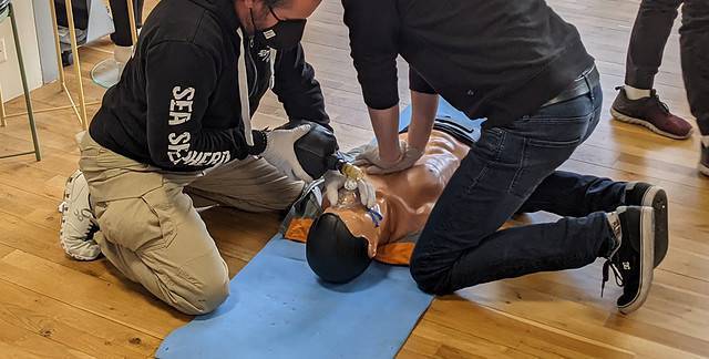 First aid students practicing CPR