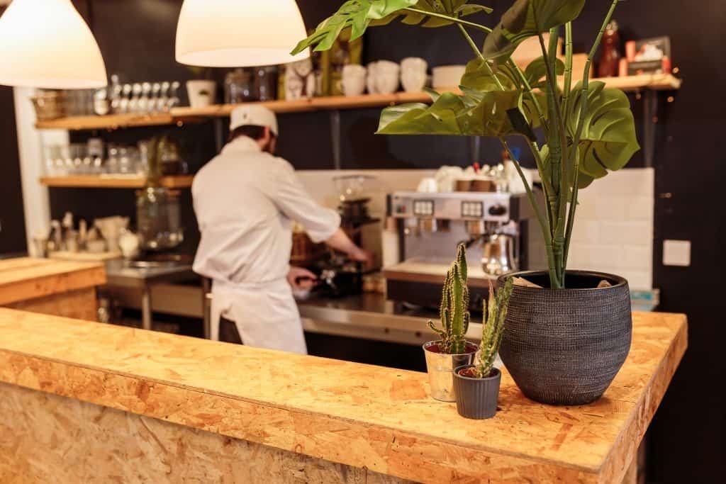 A student makes coffee at Zest Restaurant at Stranraer Campus