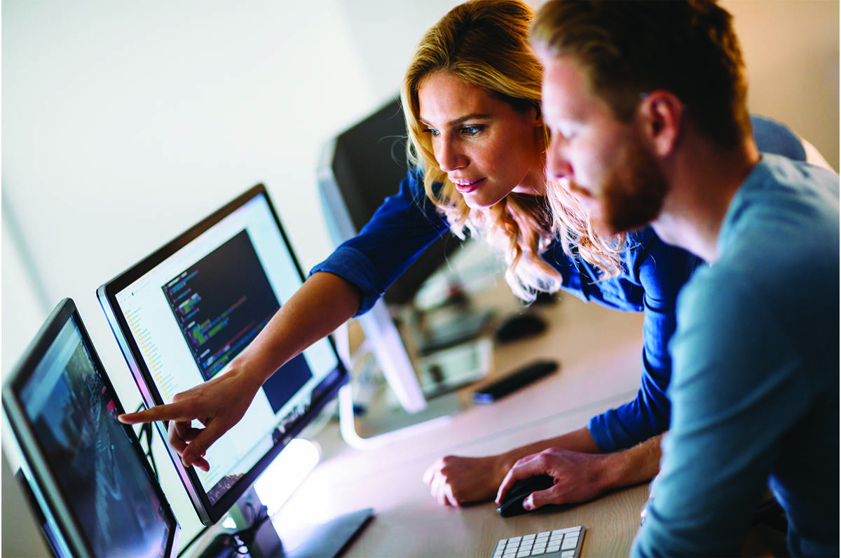 A computing lecturer advising a computing student.