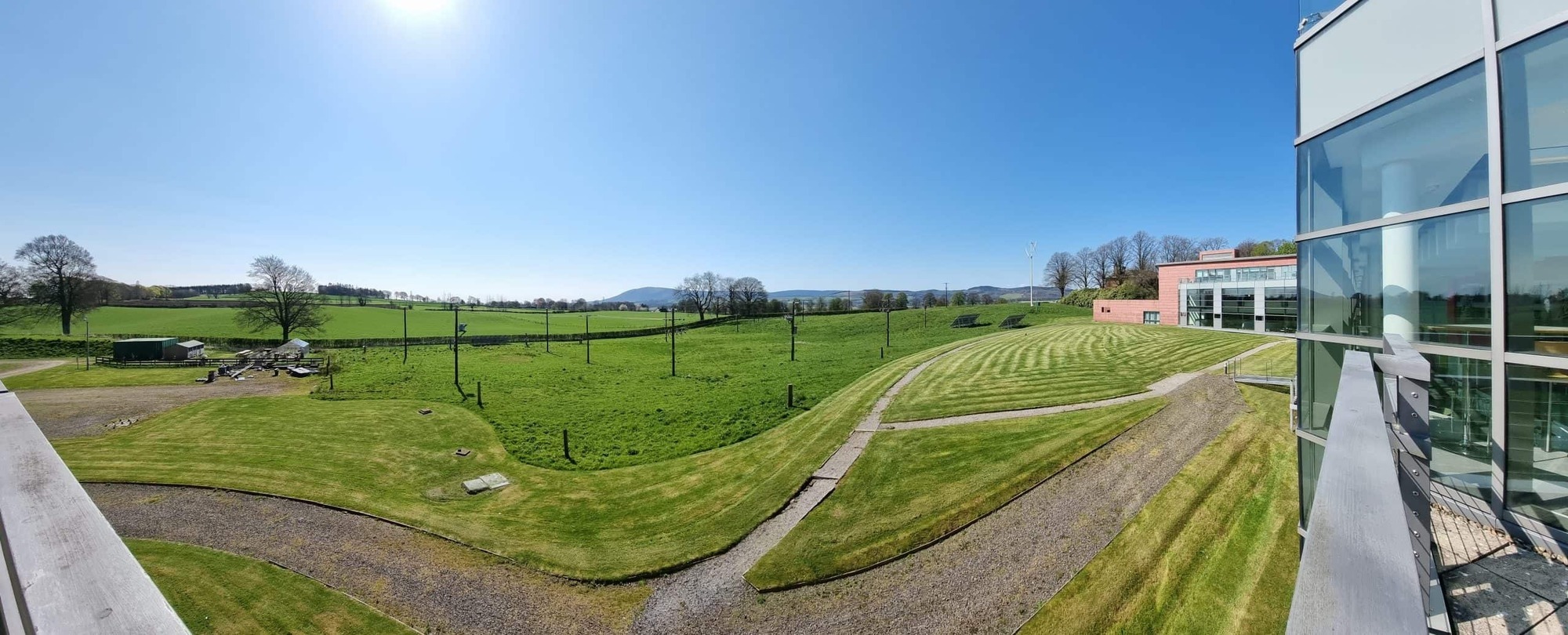 Wide photograph of the back of Dumfries Campus